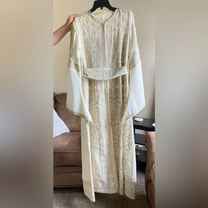 Traditional thobe , white and gold color